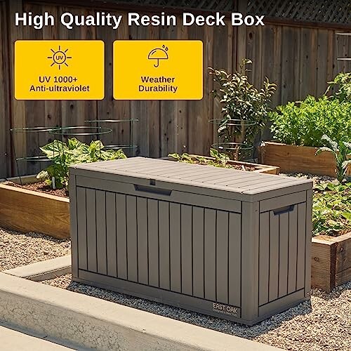 High quality resin deck box with UV protection and weather durability in a garden setting.