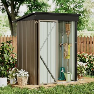 Small garden shed with tools and plants.