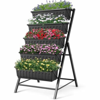 Vertical garden planter with colorful flowers in tiers.